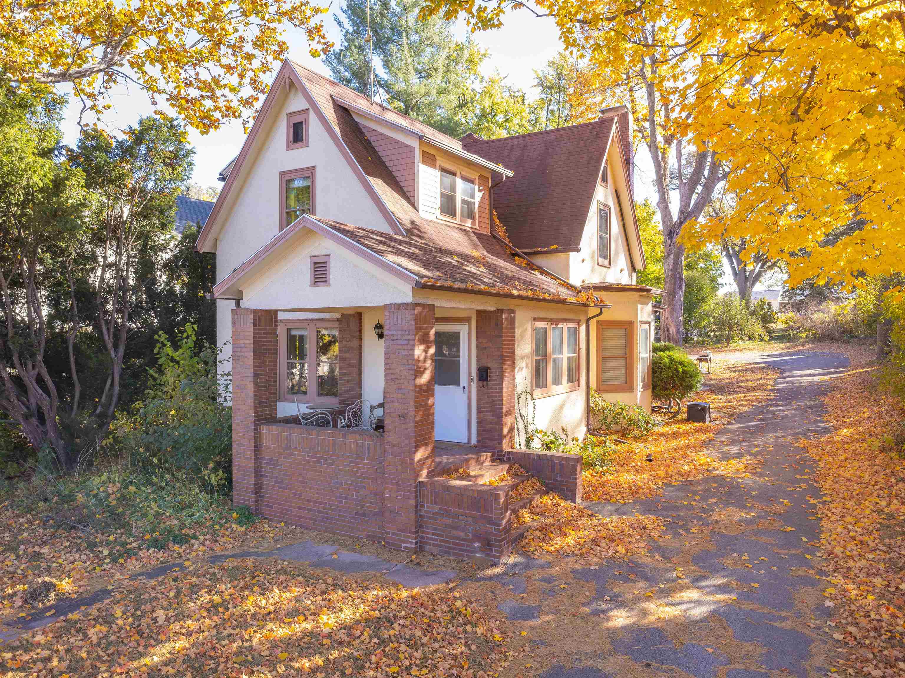 a front view of a house with a porch