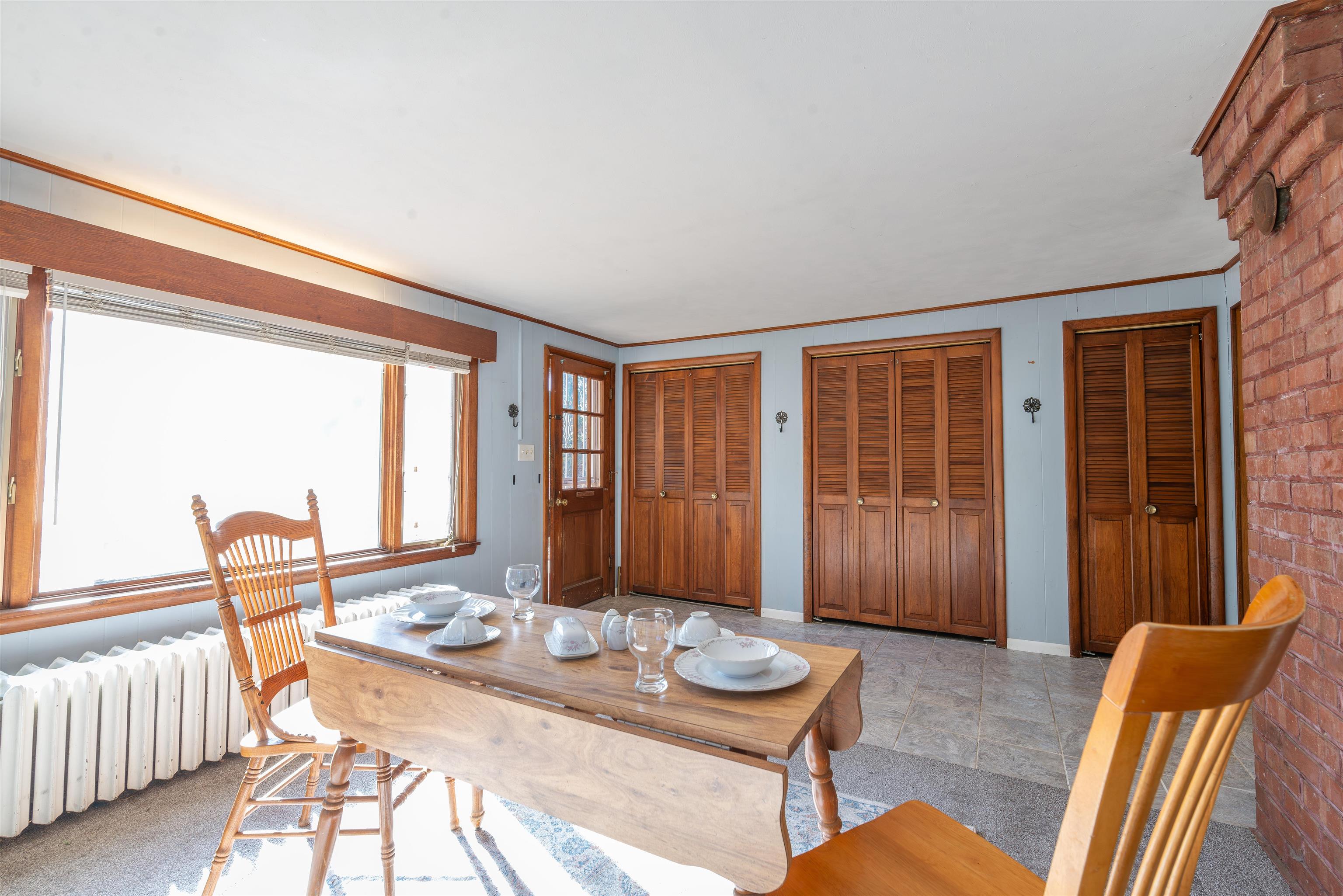 933 West Stephenson Street Freeport, IL 61032 - Photo 14 of 32 a living room with furniture and large windows