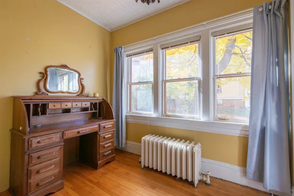 a kitchen with stainless steel appliances granite countertop a stove and a window