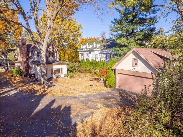 a view of residential house with an outdoor space