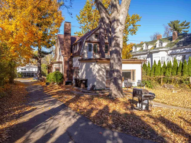 a view of a building with sitting area