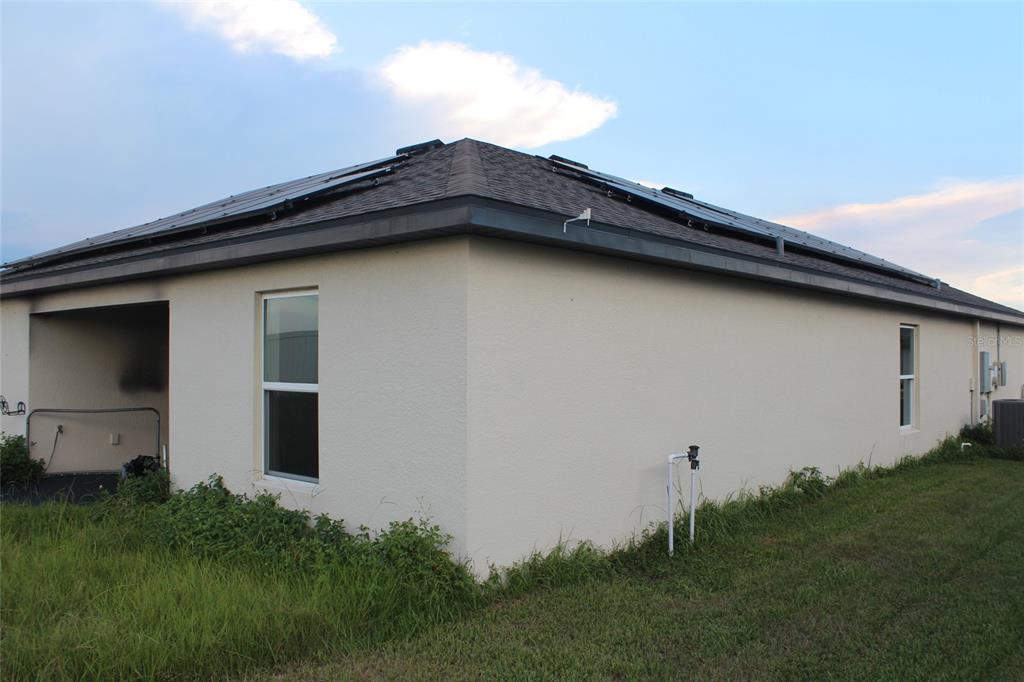 1733 Canaan Loop Dundee, FL 33838 - Photo 5 of 16 a house with a outdoor space