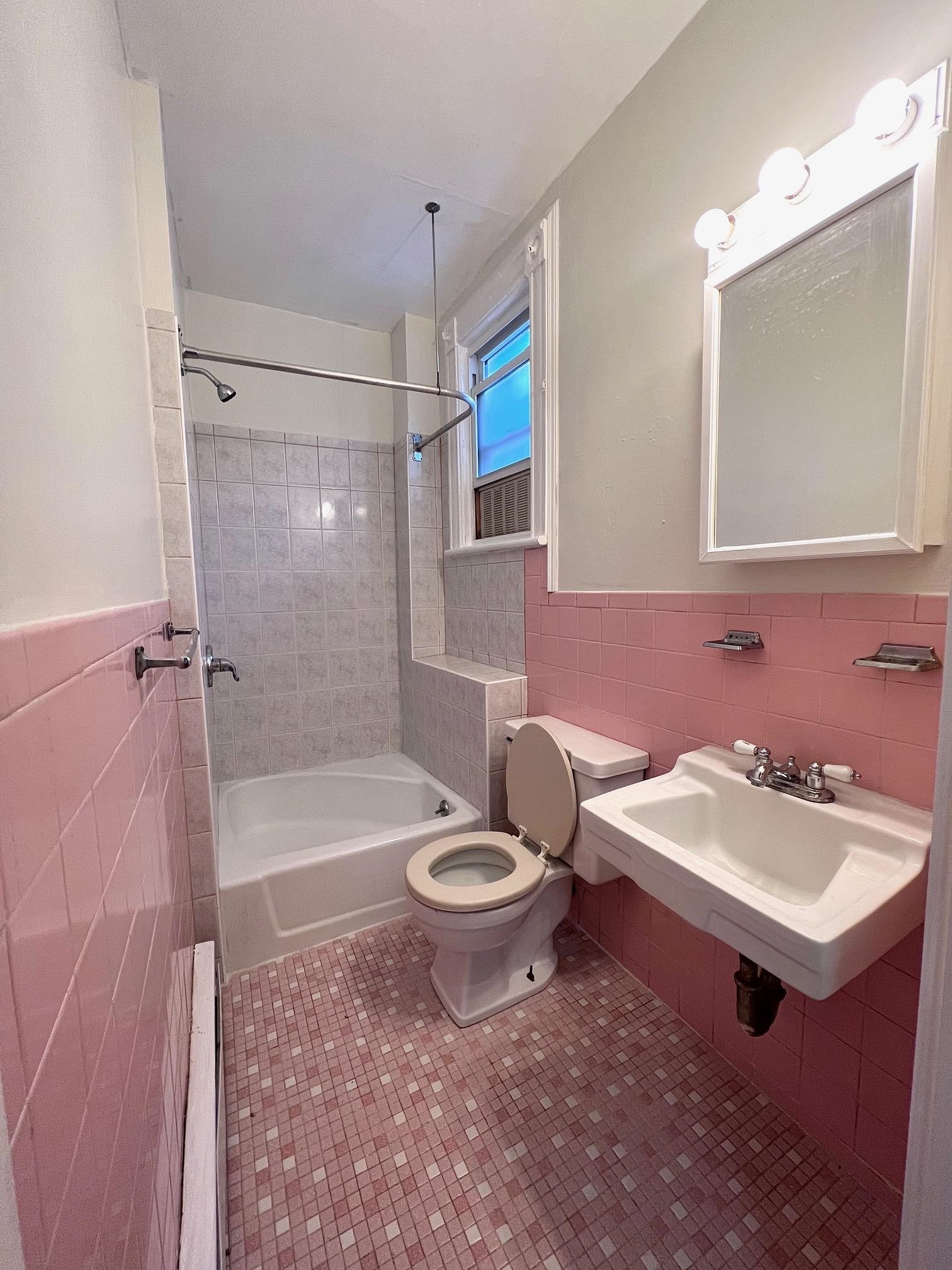 177 Park Avenue, Unit 2 East Rutherford, NJ 07073 - Photo 5 of 7 a bathroom with a sink a toilet and shower