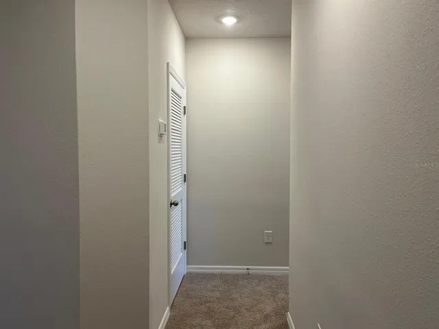 a view of an empty walk in closet