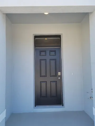 a kitchen with stainless steel appliances a microwave a sink a stove and refrigerator