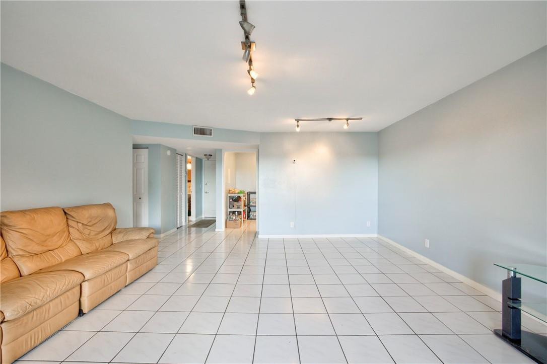 22605 Southwest 66th Avenue, Unit 401 Boca Raton, FL 33428 - Photo 5 of 29 a view of livingroom with furniture