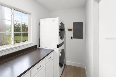 a kitchen with a sink and a window