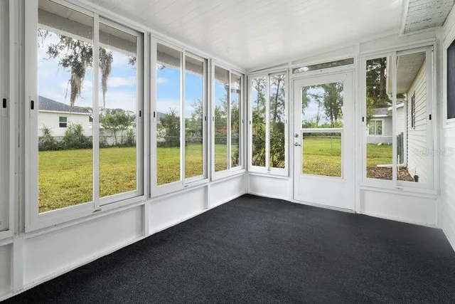 a view of a large window with an outdoor space