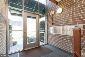 a view of a door and a window