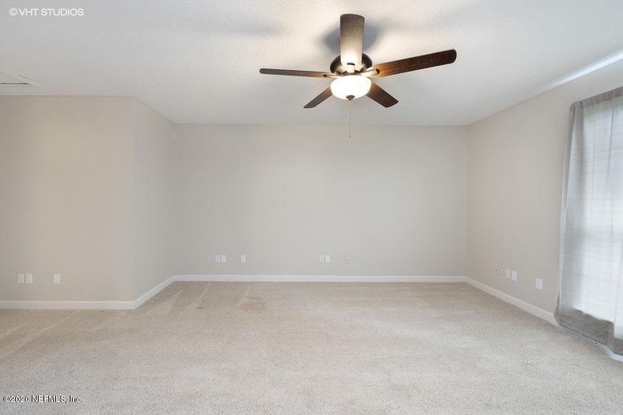 11101 Aaron Fish Road Glen St. Mary, FL 32040 - Photo 16 of 44 a view of a room with a fan