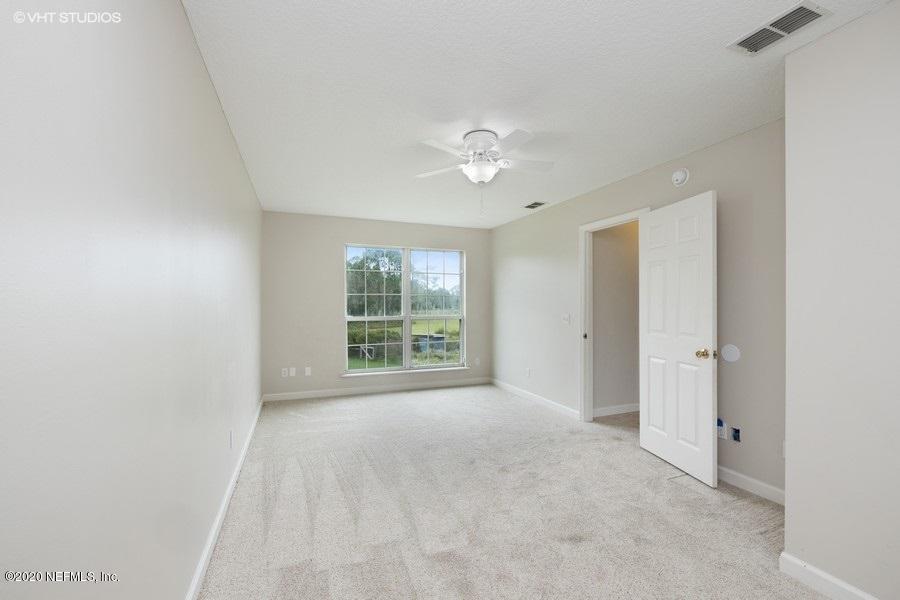 11101 Aaron Fish Road Glen St. Mary, FL 32040 - Photo 19 of 44 a view of an empty room with a window