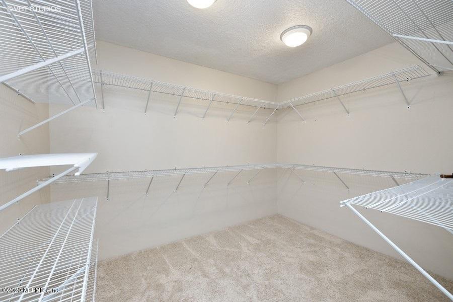 11101 Aaron Fish Road Glen St. Mary, FL 32040 - Photo 22 of 44 a view of a room with racks on the wall