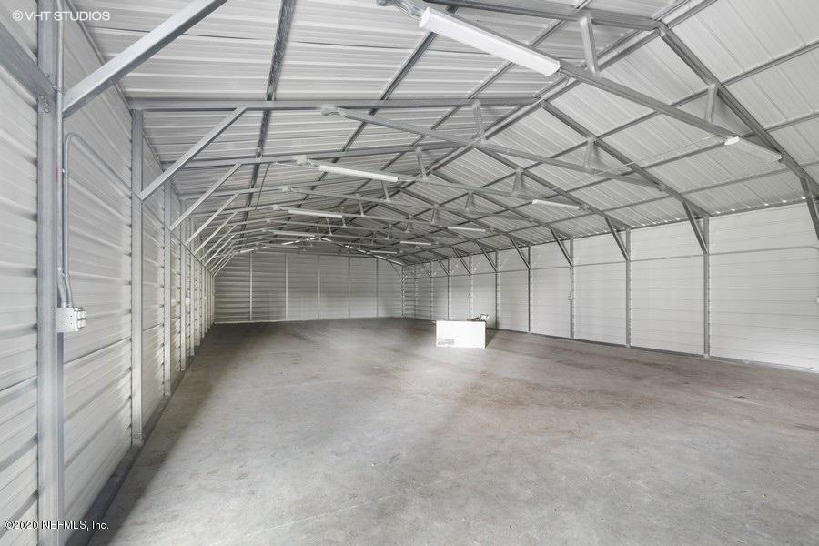 11101 Aaron Fish Road Glen St. Mary, FL 32040 - Photo 27 of 44 a view of a room with lots of white walls