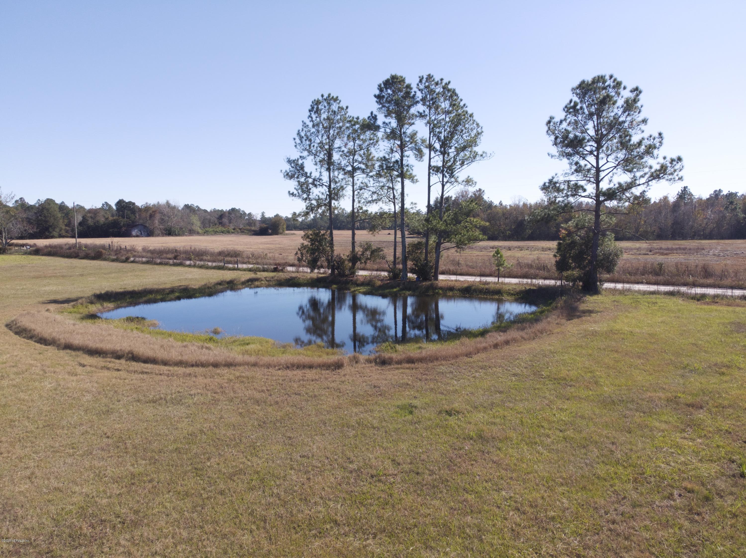 11101 Aaron Fish Road Glen St. Mary, FL 32040 - Photo 31 of 44 a view of a lake with outdoor space