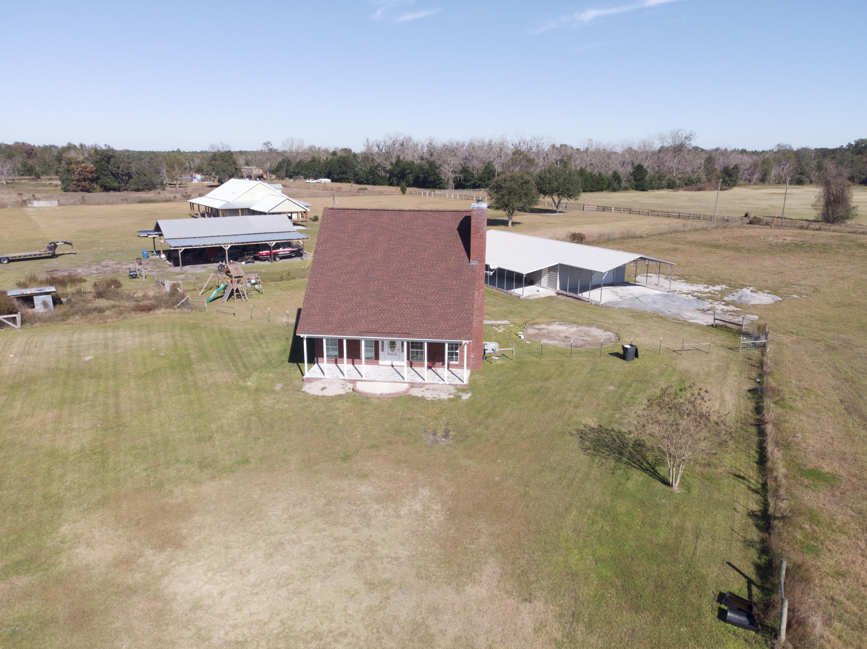 11101 Aaron Fish Road Glen St. Mary, FL 32040 - Photo 33 of 44 a view of a lake with a mountain