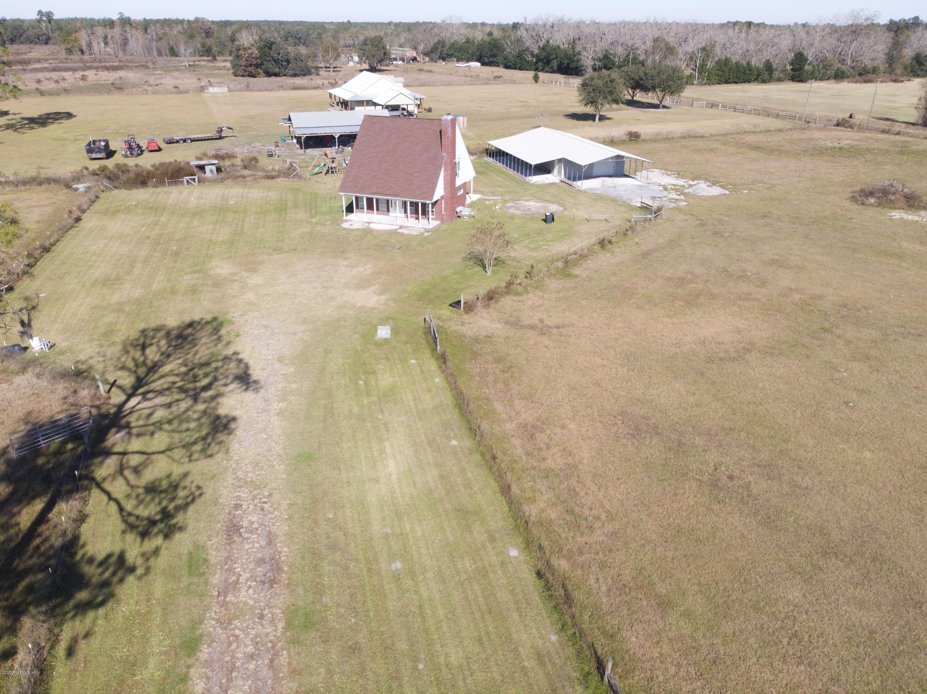 11101 Aaron Fish Road Glen St. Mary, FL 32040 - Photo 43 of 44 a view of a lake with beach