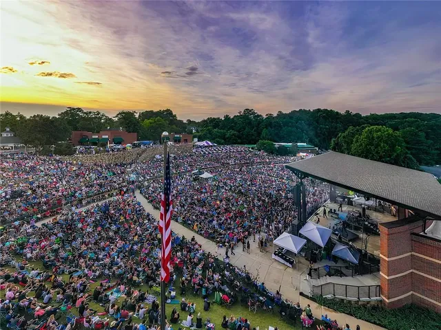 front view of a house next to a road