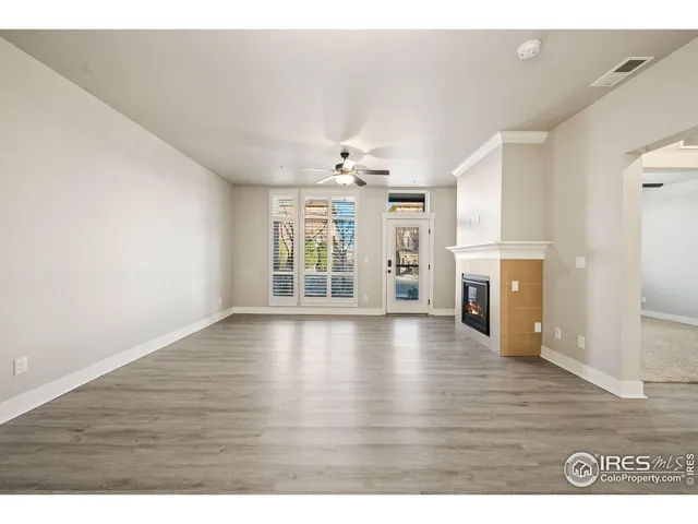 a view of a kitchen with a sink and a kitchen counter top space