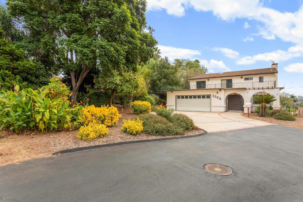 a view of a house with a street