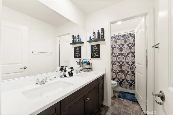 a room with furniture and a flat screen tv