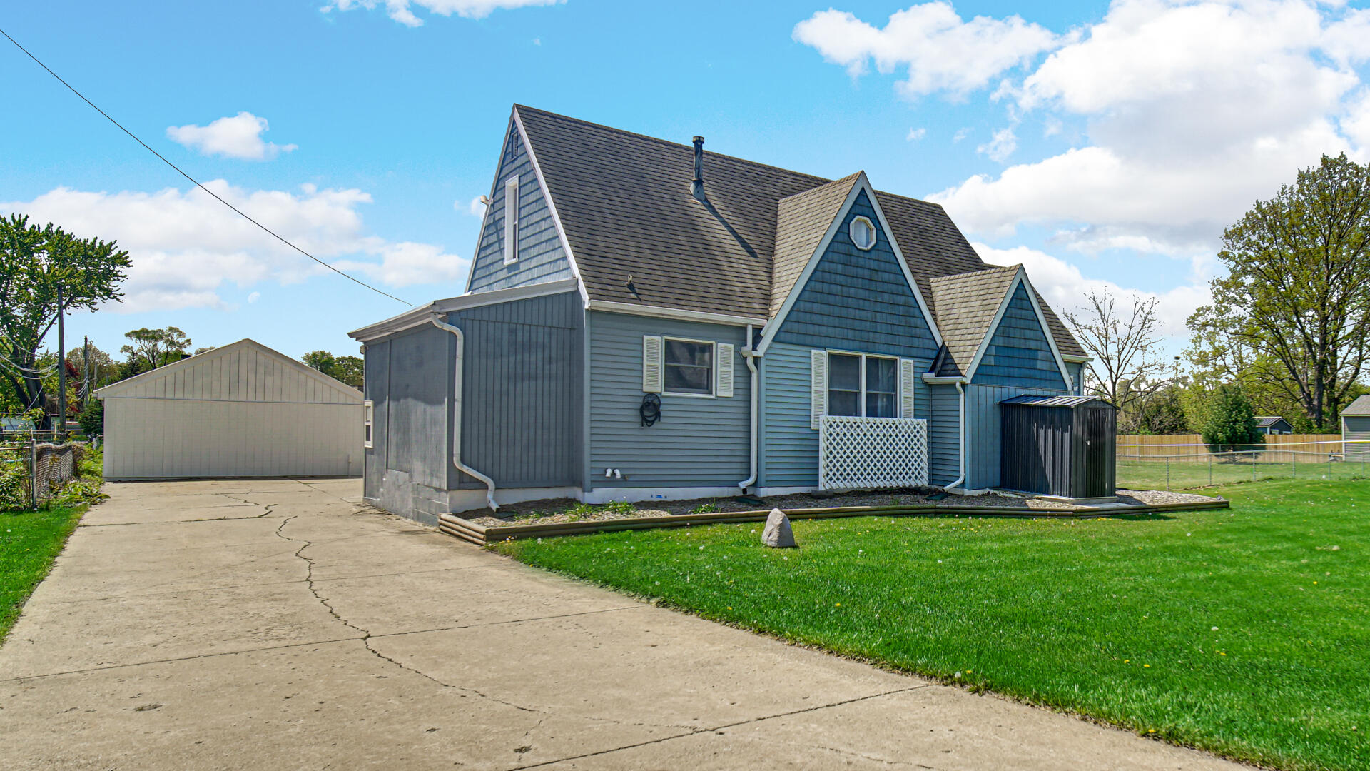 324 West Johnson Road La Porte, IN 46350 - Photo 1 of 34 a front view of house with a garden and yard