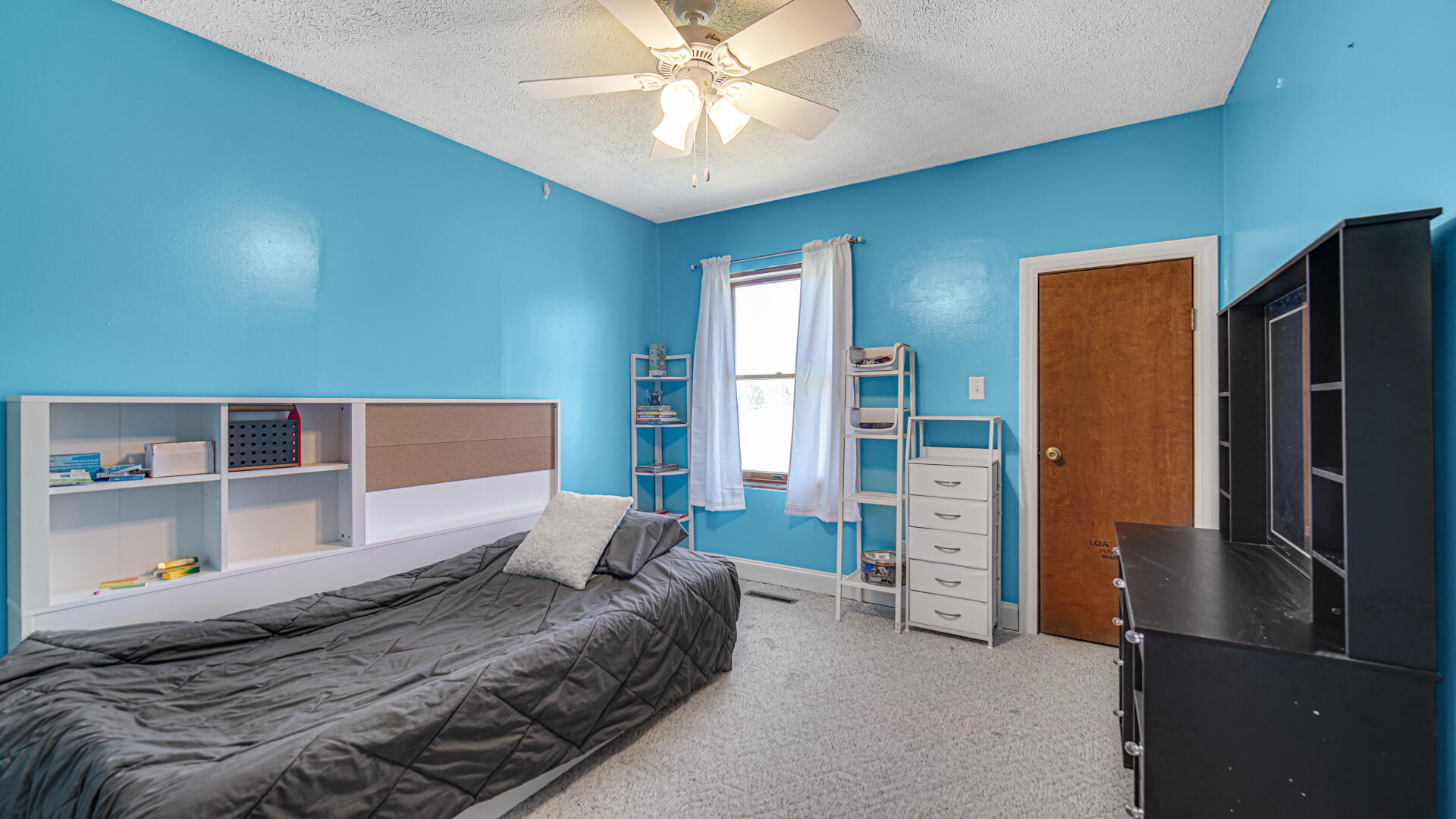 324 West Johnson Road La Porte, IN 46350 - Photo 15 of 34 a bedroom with a bed and a walk in closet