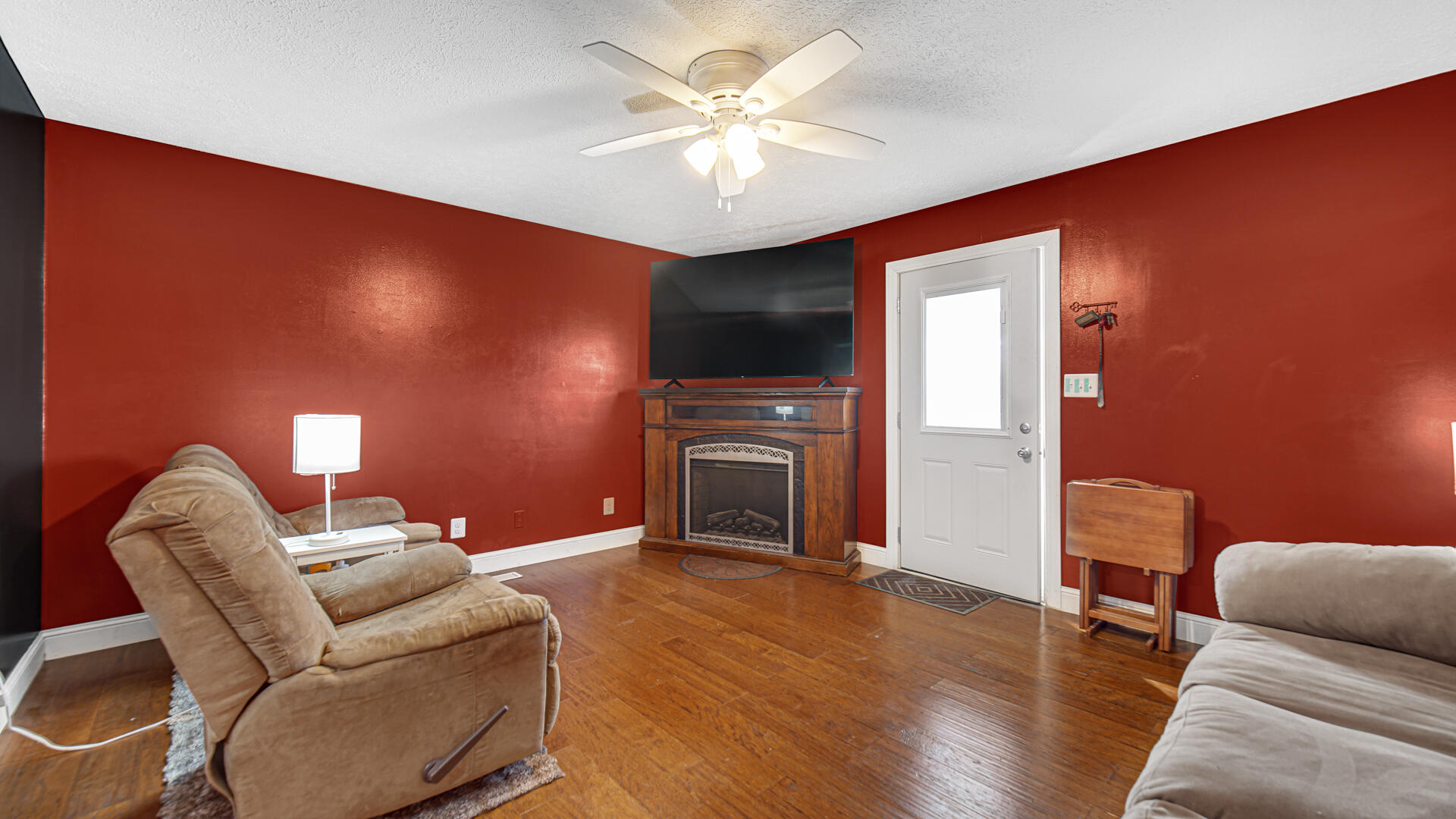 324 West Johnson Road La Porte, IN 46350 - Photo 20 of 34 a living room with furniture and a fireplace
