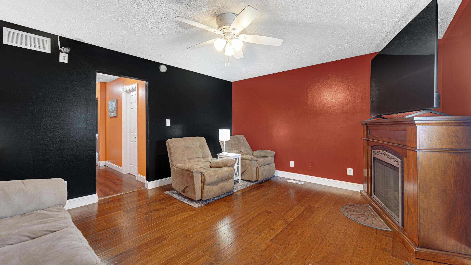324 West Johnson Road La Porte, IN 46350 - Photo 21 of 34 a living room with furniture and a ceiling fan