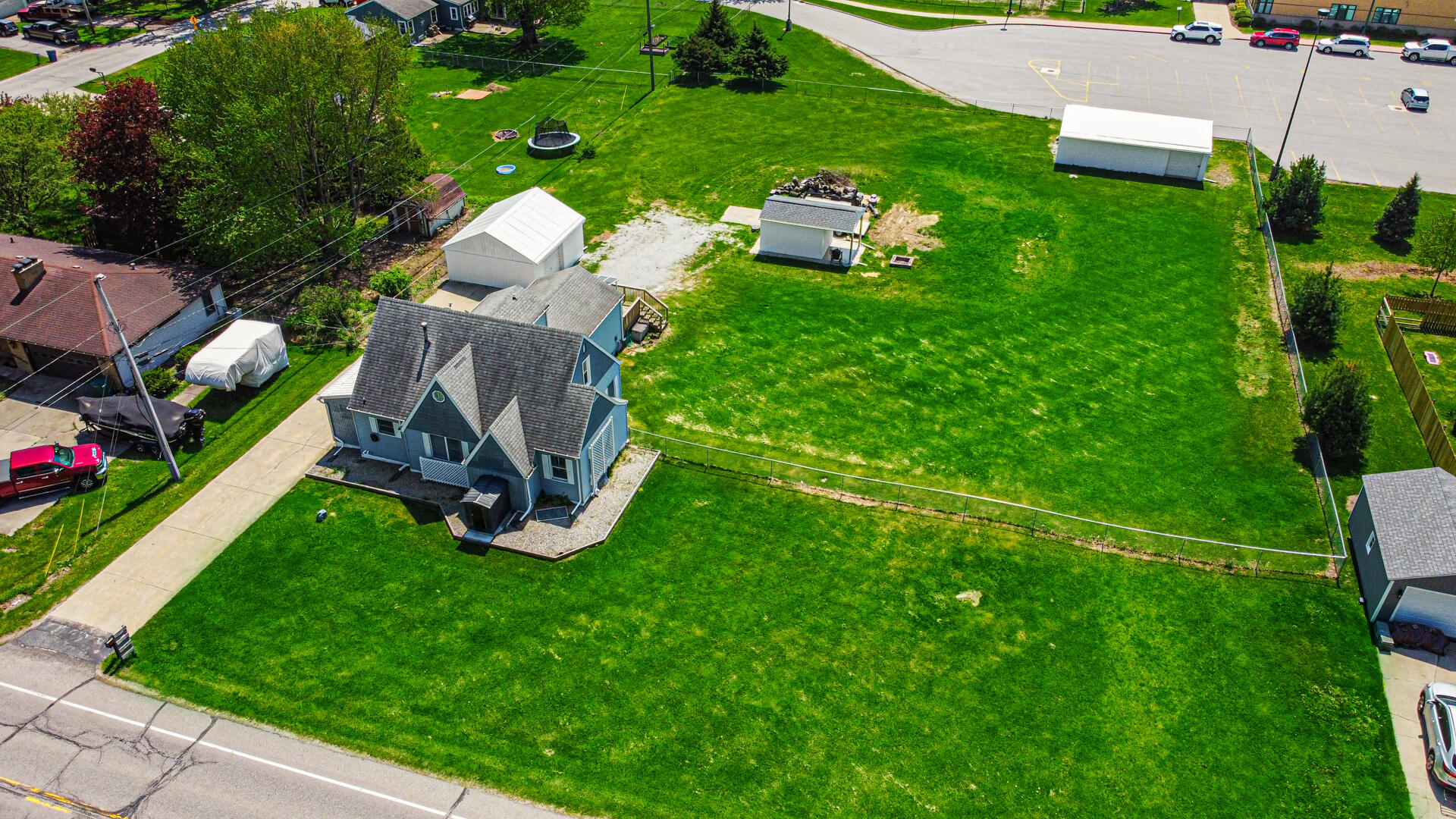324 West Johnson Road La Porte, IN 46350 - Photo 3 of 34 an aerial view of residential houses with outdoor space and street view