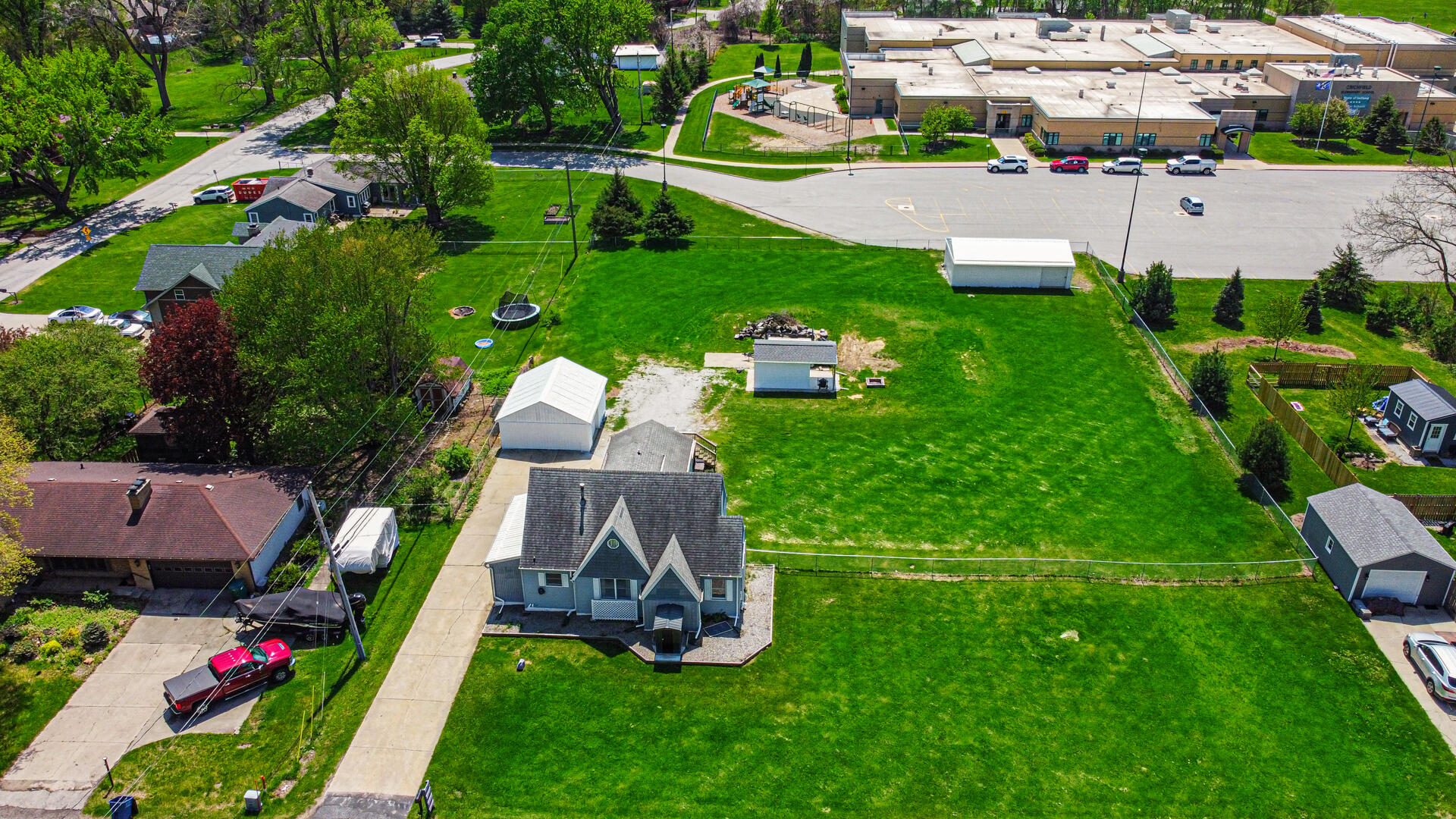 324 West Johnson Road La Porte, IN 46350 - Photo 4 of 34 a aerial view of a house with pool yard and outdoor seating