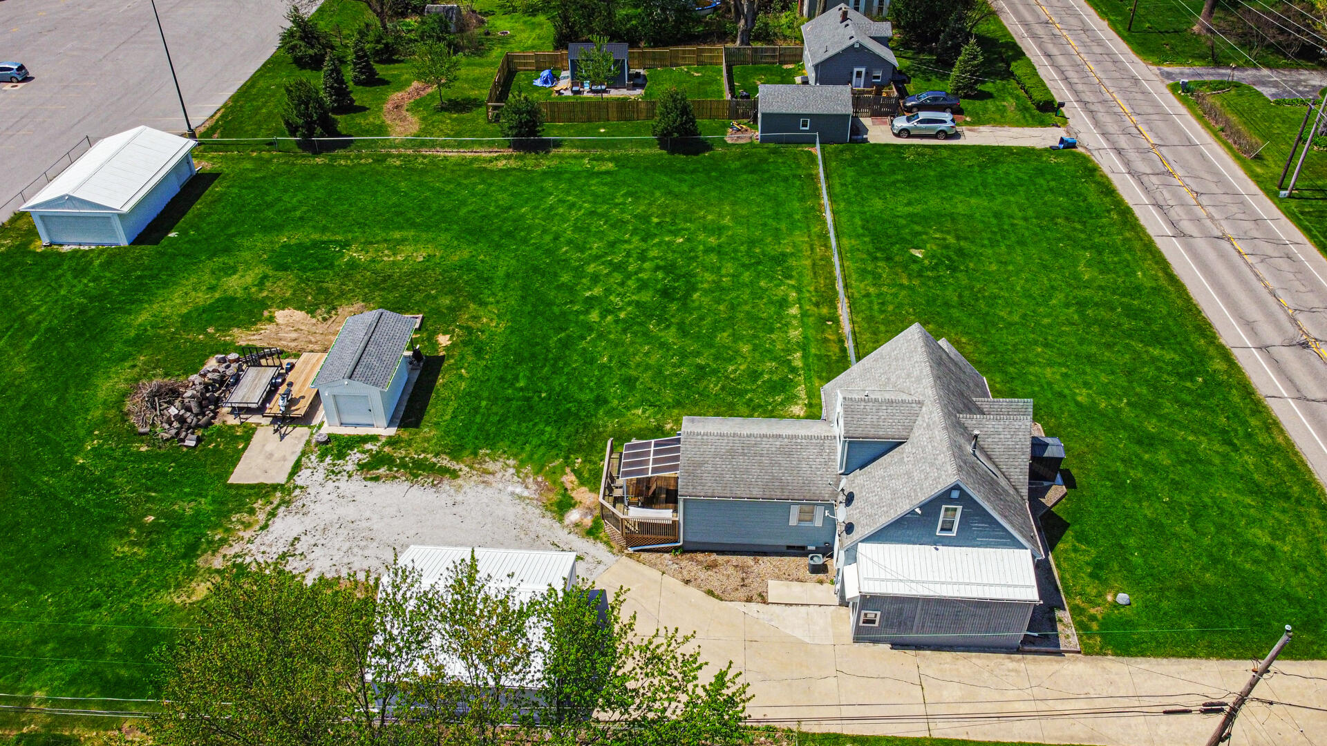 324 West Johnson Road La Porte, IN 46350 - Photo 7 of 34 an aerial view of a house with garden space and street view