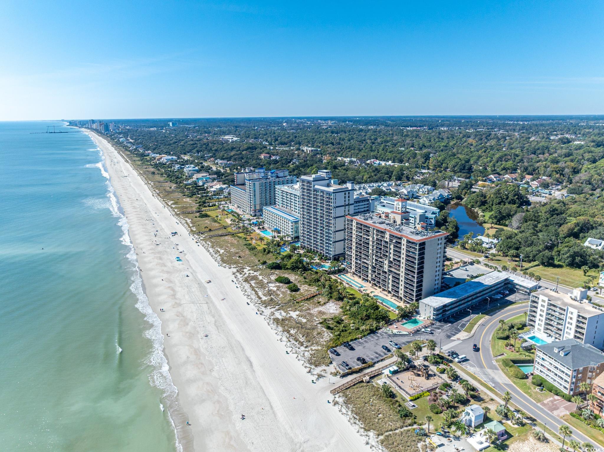5307 North Ocean Boulevard Myrtle Beach, SC 29577 - Photo 36 of 39 Drone / aerial view of waterfront with a beach