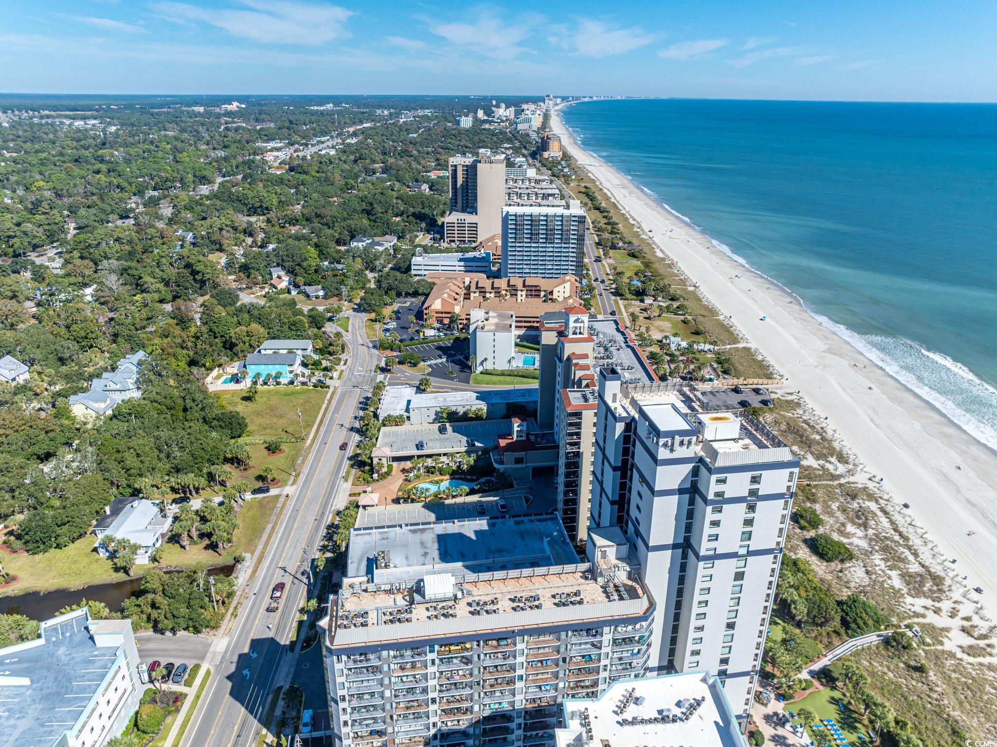 5307 North Ocean Boulevard Myrtle Beach, SC 29577 - Photo 37 of 39 View of urban area with waterfront with a beach
