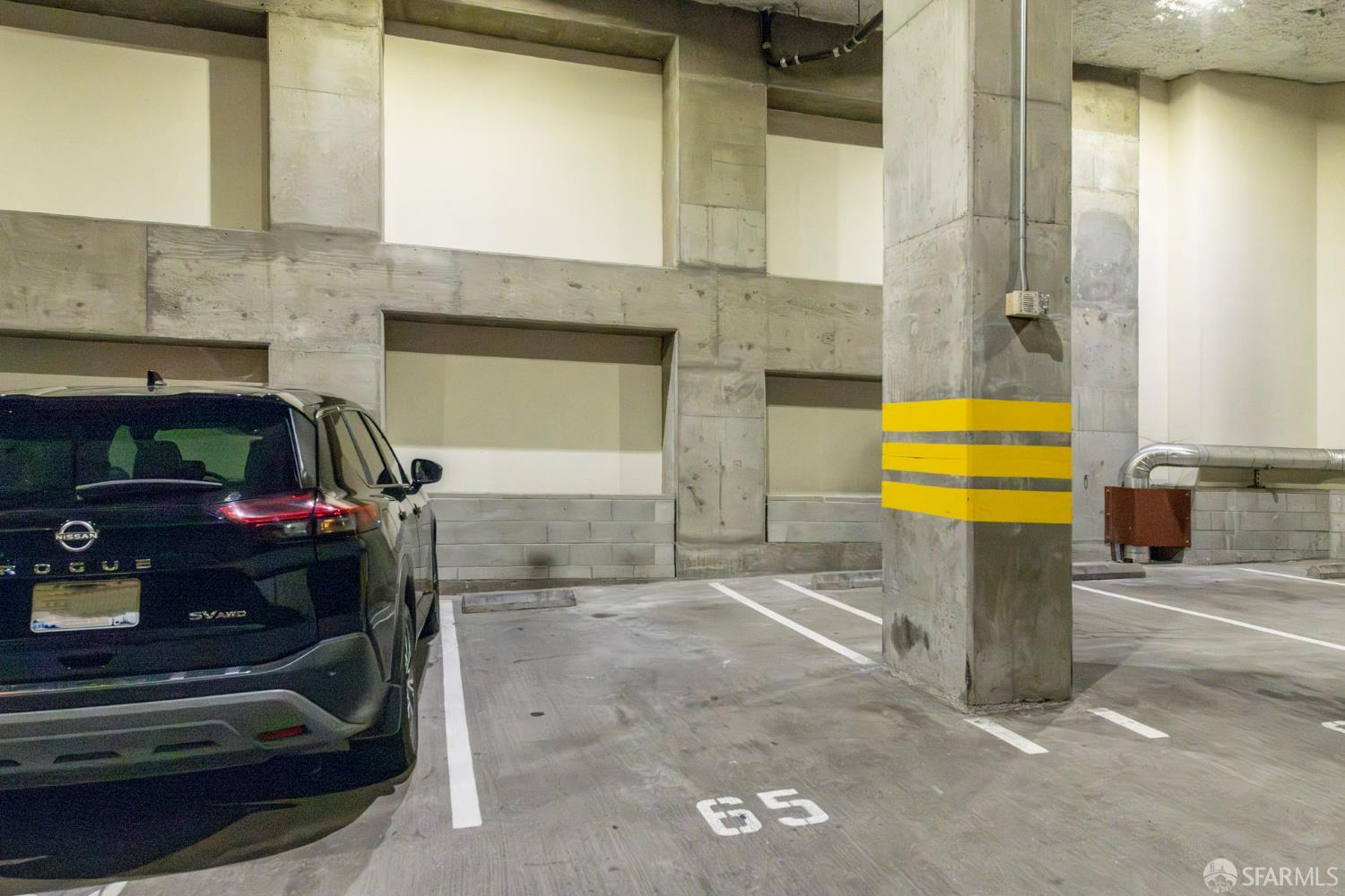 246 2nd Street, Unit 703 San Francisco, CA 94105 - Photo 26 of 30 a bathroom with a sink and a mirror