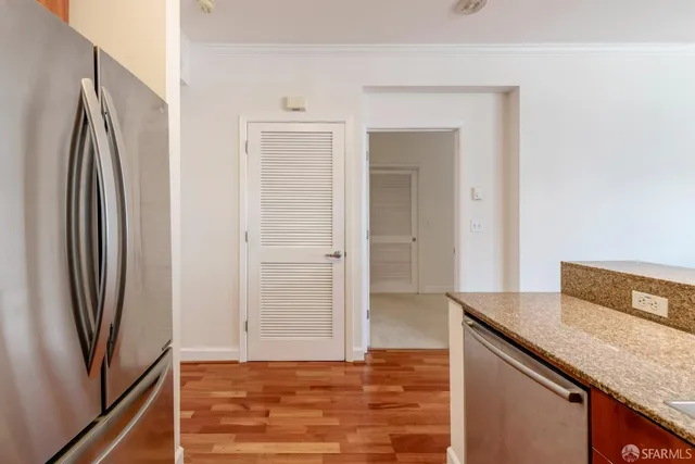 a view of a refrigerator in kitchen