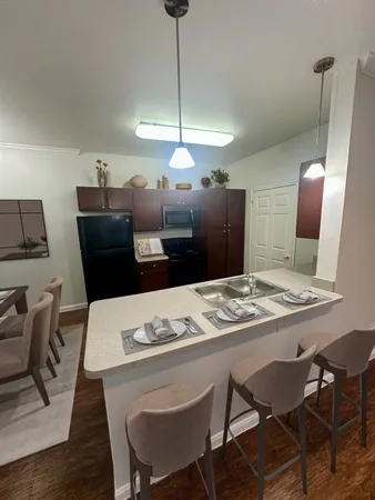 a view of a dining room with furniture