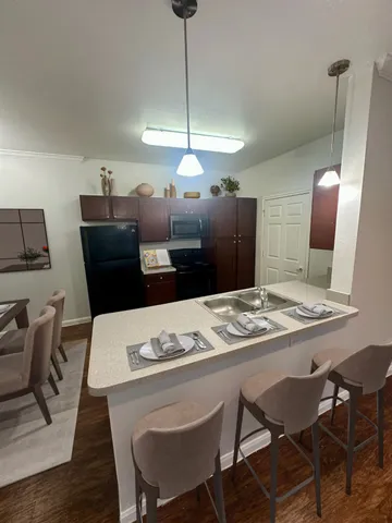 a view of a dining room with furniture