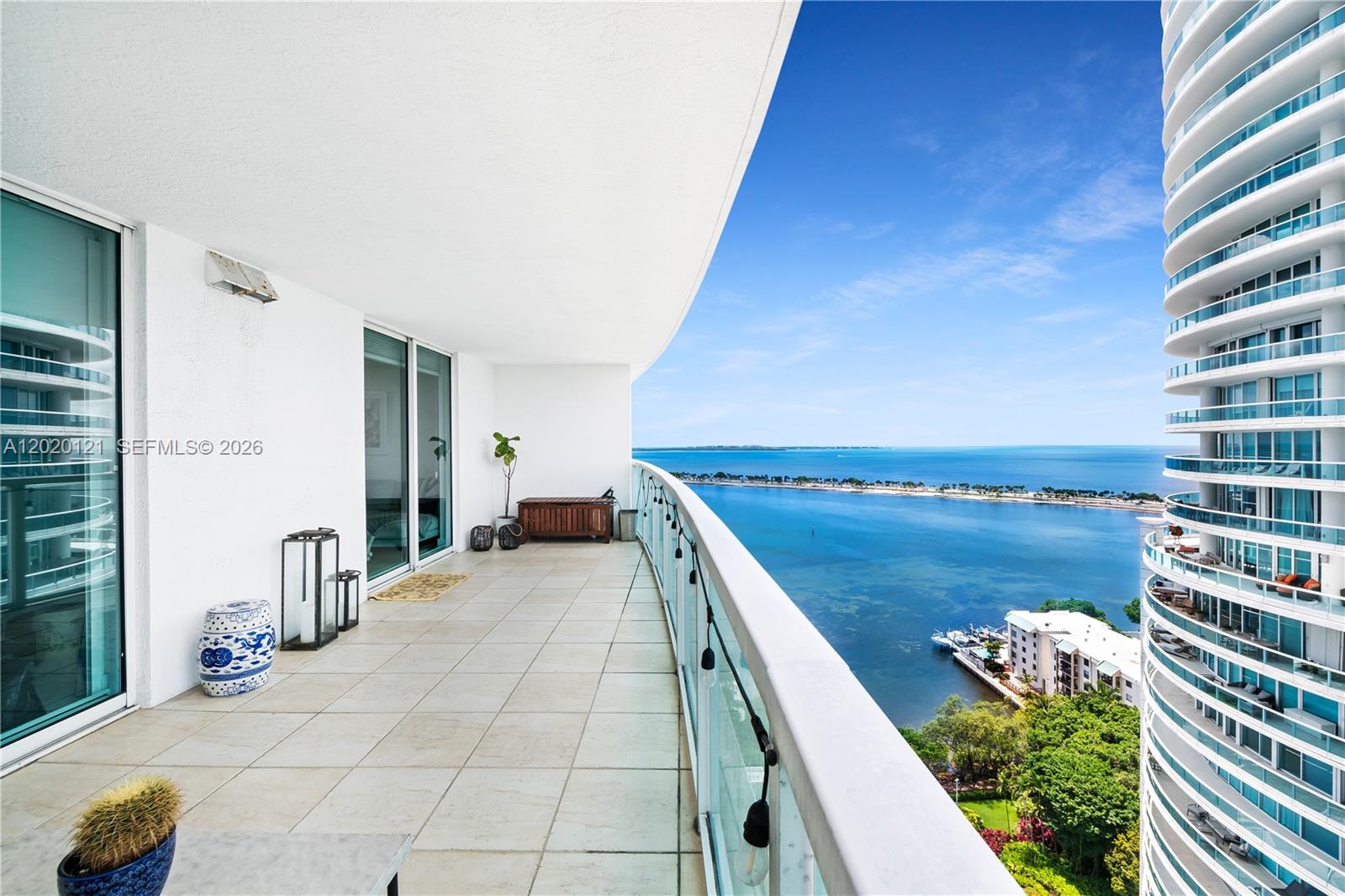 2101 Brickell Avenue, Unit 1909 Miami, FL 33129 - Photo 17 of 25 a balcony with view of nearby houses