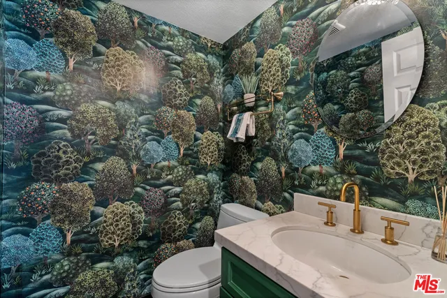 a bathroom with a sink and a toilet