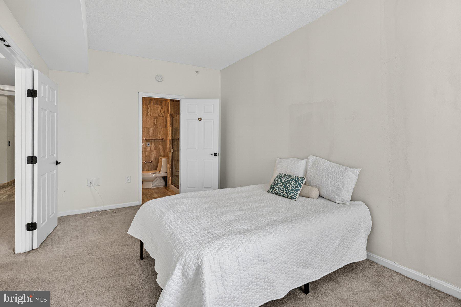 3801 Canterbury Road, Unit 403 Baltimore, MD 21218 - Photo 12 of 25 Bright and inviting bedroom retreat.