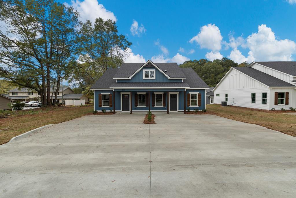 308 Burns Avenue Pine Mountain, GA 31822 - Photo 1 of 17 a front view of a house with a yard