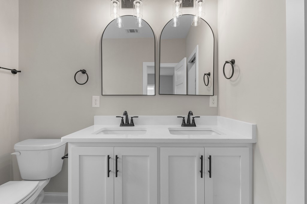 308 Burns Avenue Pine Mountain, GA 31822 - Photo 15 of 17 a bathroom with a sink vanity and toilet