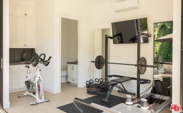 a patio with a yard table and chairs