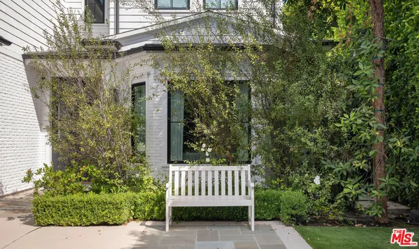 a view of a porch with a bench