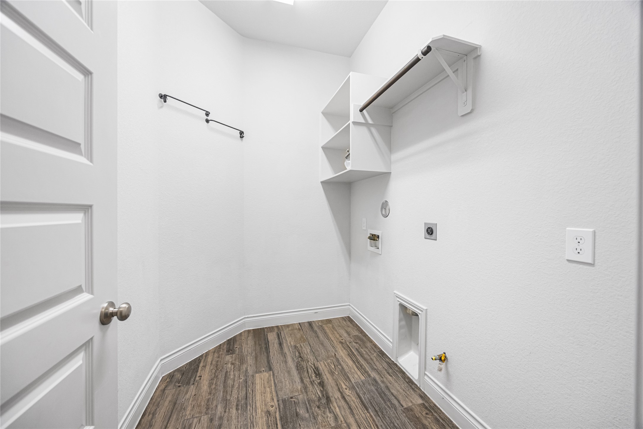 28169 Knight Peak Drive Spring, TX 77386 - Photo 25 of 33 a view of a room with racks on the wall