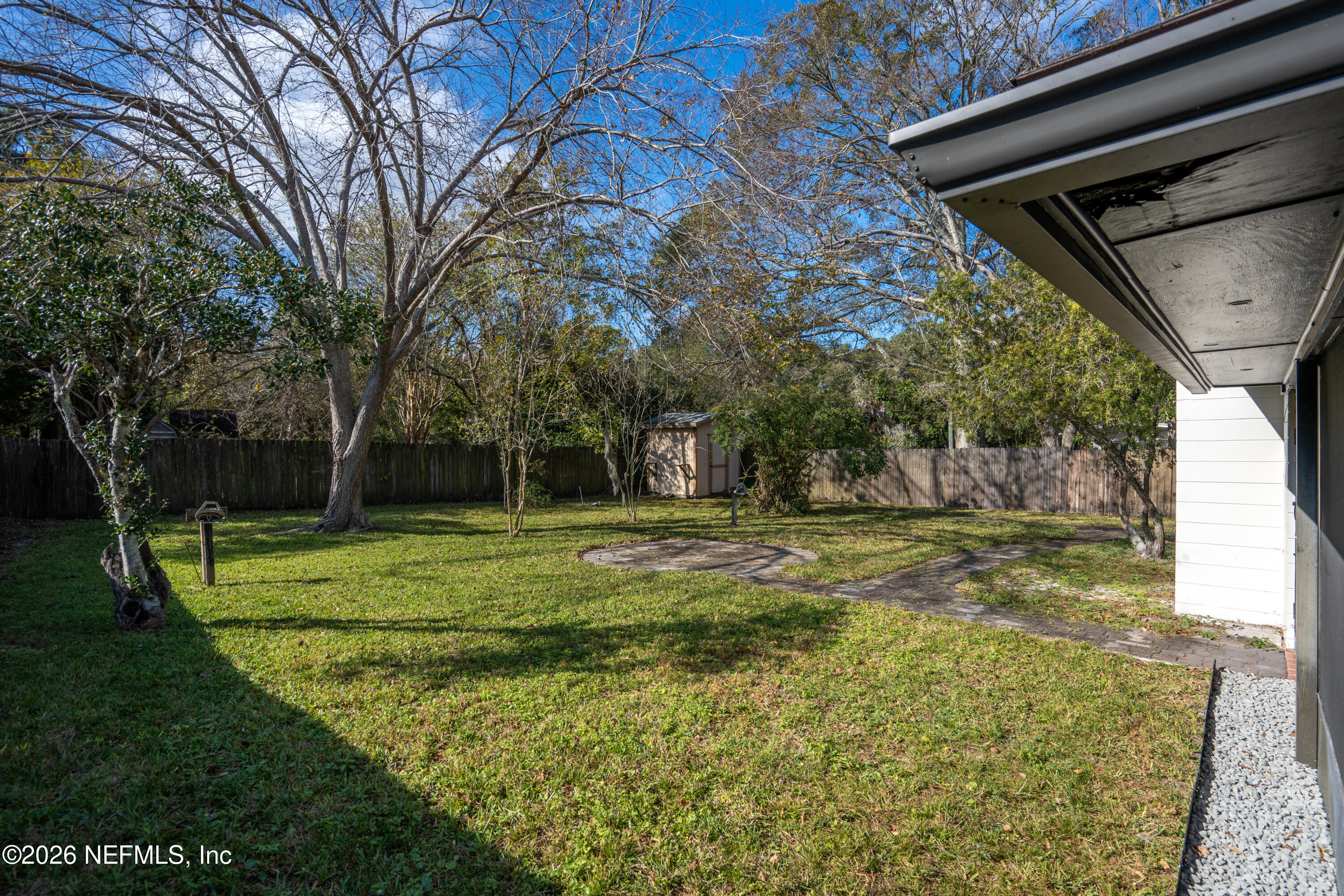 1241 Hibiscus Street St. Augustine, FL 32084 - Photo 24 of 27 a view of a trees in front of a house