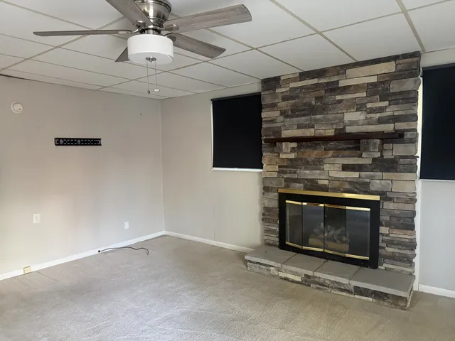 a room with a bed and a window