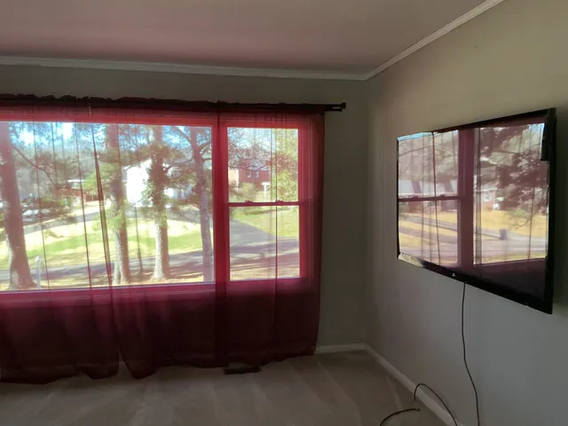 an empty room with windows
