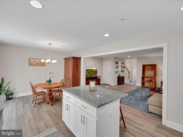 a view of a kitchen and dining room
