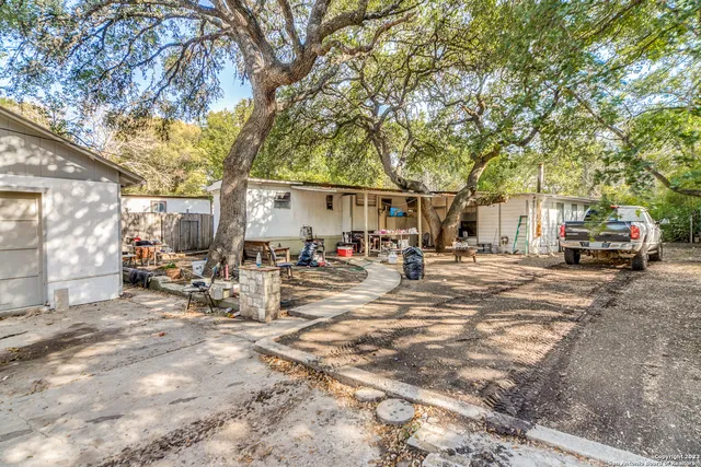 a view of a street with cars on road